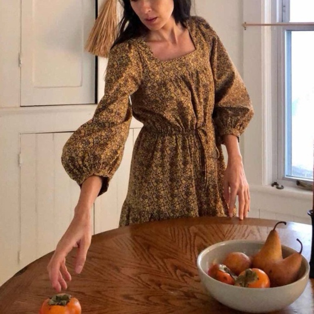 Christy Dawn Finley in golden blooming vine